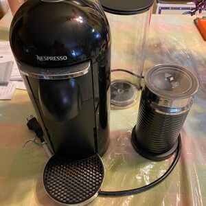 Nespresso Glossy Black Coffee Maker with Frother